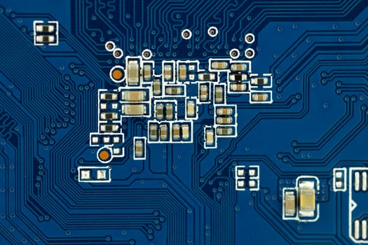 Close-Up of Blue Circuit Board photo