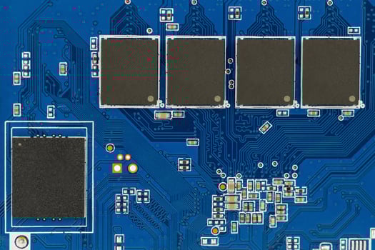 Close-up of Blue Circuit Board Components photo