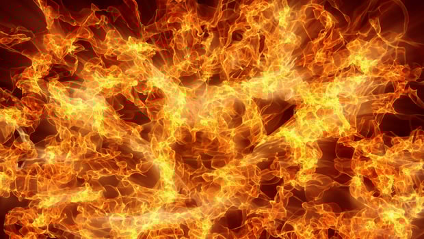Abstract Fire Flame Texture Background with Light Rays photo