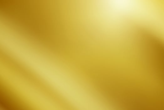Abstract gold gredient metal color theme satin texture background. Lighting effects of flash. Blurred background with light glare. photo
