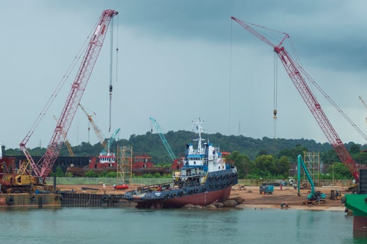 Batam, Indonesia. June 29, 2024. the process of raising the tugboat to the docx where maintenance will be carried out photo