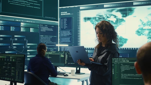 Governmental hackers execute cyber attacks by breaking passwords, compromising online security. Specialists infiltrate digital networks, breaching security protocols. Cyber surveillance. Camera B. photo