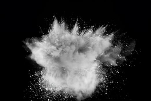 Colorful Powder Explosion on Black Background photo