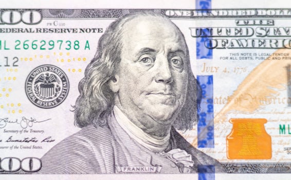 Close up shot of the 100 US dollars note bill. Finance photo