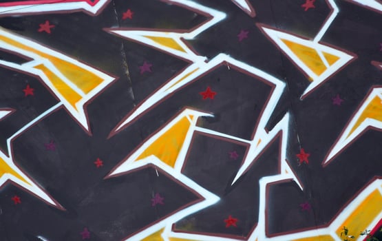 Colorful background of graffiti painting artwork with bright aerosol outlines on wall. Old school street art piece made with aerosol spray paint cans. Contemporary youth culture photo