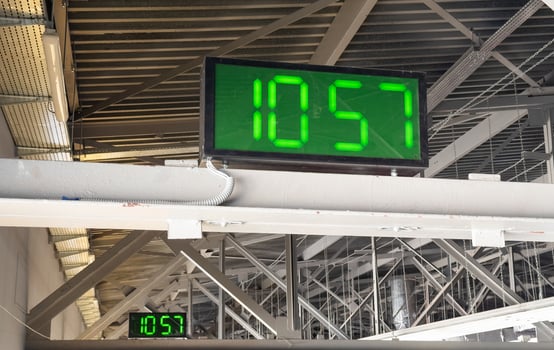 Digital clock in airport terminal. photo