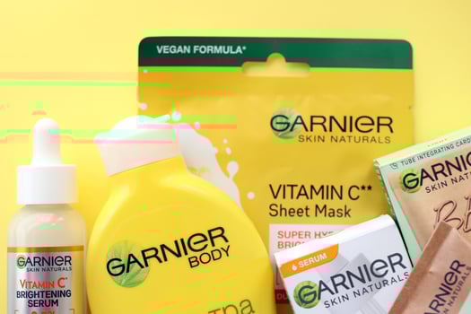 KYIV, UKRAINE - APRIL 20, 2024 Garnier production with company logo. Garnier is a mass market cosmetics brand of French cosmetics company L'Oreal photo