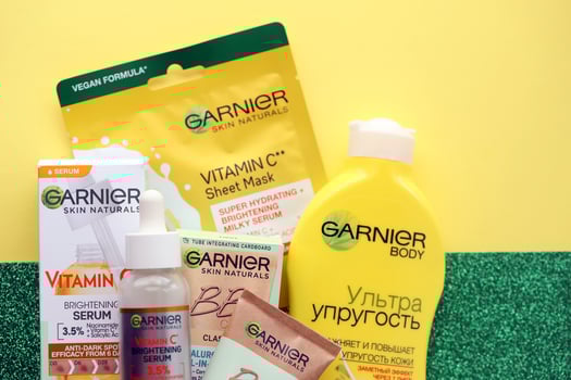 KYIV, UKRAINE - APRIL 20, 2024 Garnier production with company logo. Garnier is a mass market cosmetics brand of French cosmetics company L'Oreal photo
