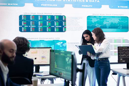 Professional forecast affiliates group work in monitoring room, making crucial decisions together to ensure objectives accomplishment and work on international business expansion. photo