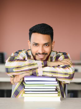 Handsome and young indian Male college student. photo
