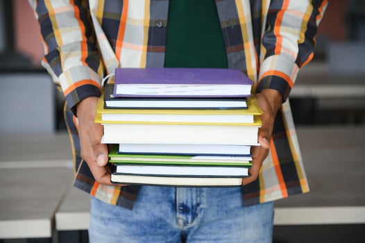 indian student with books at university photo