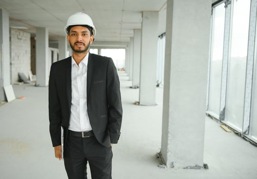 Portrait of a Indian engineer posing at the camera photo