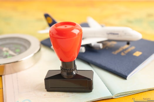 Approved Stamp visa and passport document to immigration at airport in country. photo