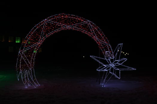 Neon Figure Night Christmas Illumination Star Arch Festive Atmosphere photo