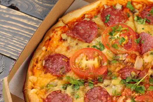 pizza in box open. Pizza in the in delivery box photo