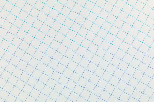 School notebook texture blank sheet. Cells in a notebook background or texture. photo