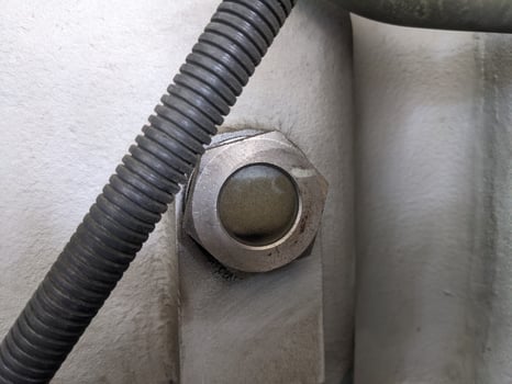 Close Up of a Sight Glass oil level on air compressor photo