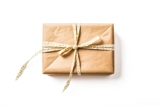 Brown Gift Box With Gold Polka Dot Ribbon photo
