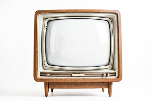 Vintage television set with blank screen on white background photo