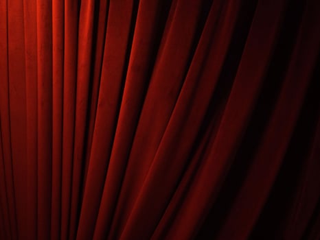 Red pink orange color gradient background wallpaper curtain waving vulvet stage theatre entertainment presentation opera art drape concert ceremony cinema show textile film cloth front dark advertise photo