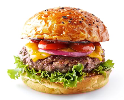 a hamburger with cheese, lettuce and tomatoes photo