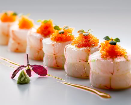 a white plate with shrimp and orange garnish photo