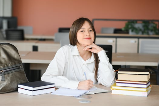 girl at the desk in school photo
