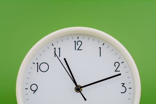 Time and the law of time, the limits of work, a stationary hand, studio photography, time concept. photo