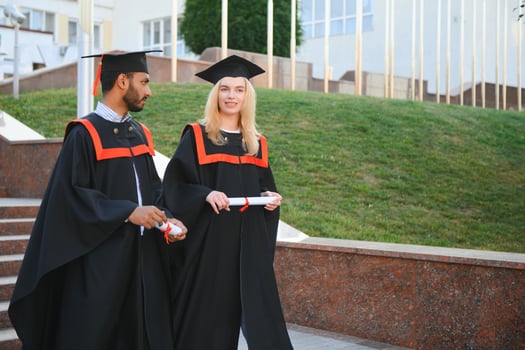 education, graduation and people concept - group of happy international students. photo
