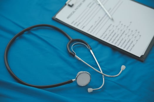 In a hospital setting, the presence of a doctor's physician book and stethoscope carries with it an air of professionalism and dedication to patient care. photo