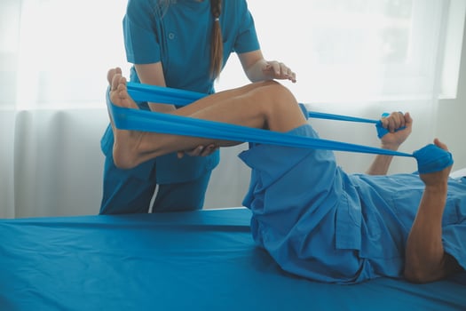 Physical therapists work with patients in close-up clinics. The concept of rehabilitation of physical health, the doctor gives advice to the patient. Ankle problems and muscle injuries photo