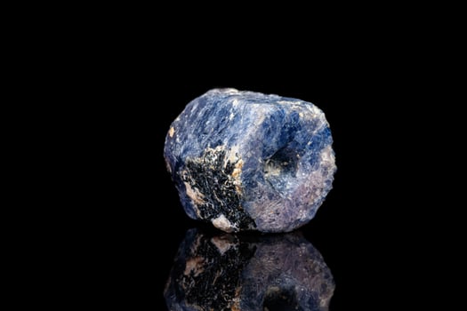 macro mineral stone sapphire on a black background photo