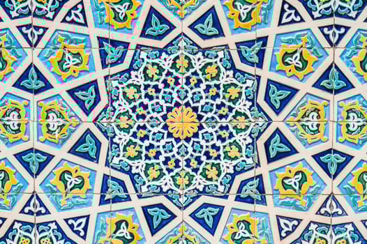old ceramic tiles with traditional oriental Arabic Uzbek pattern decorated Asian ornaments photo
