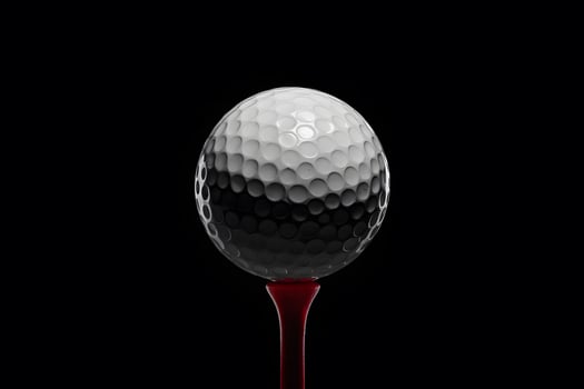 Golf ball on red tee against stark black background, textured pattern photo