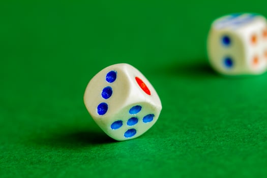 gaming dice on a rich green background. casino, betting and entertainment photo