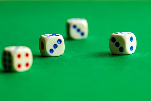 gaming dice on a rich green background. casino, betting and entertainment photo