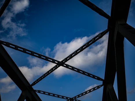 bridge top with a blue sky with clouds photo