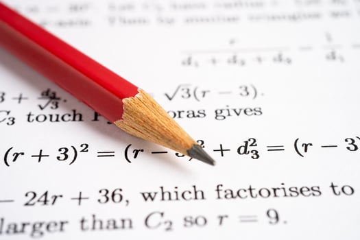 Pencil on mathematic formula exercise test paper in education school. photo