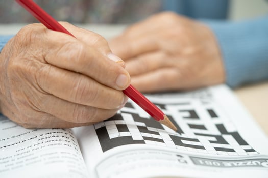Bangkok, Thailand May 1, 2024 Alzheimer disease AD, Asian elderly woman playing sudoku puzzle game. photo