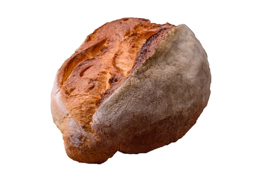 A loaf of brown bread with grains of cereals photo