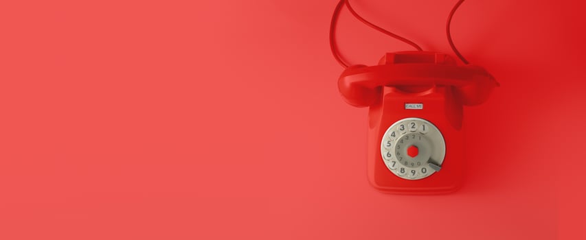 A red vintage dial telephone. photo