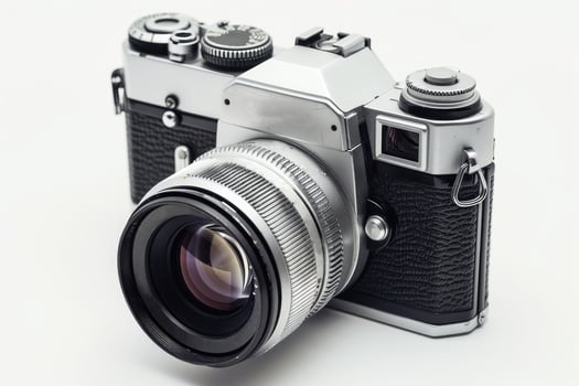 Old camera isolated on white. photo