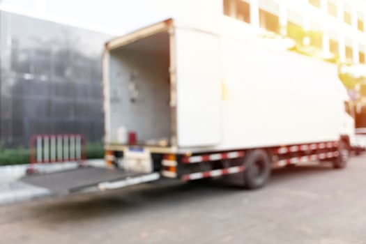 Blurred modern trucks of involved photo