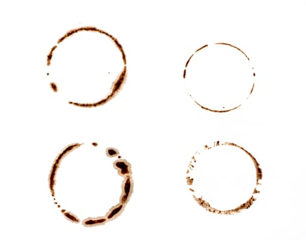 Cup ring splashes and circle drink marks. Brown dirty mug stains. Coffee grunge texture photo