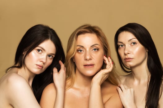 Diverse Age Group Women Portrait on Beige Background photo