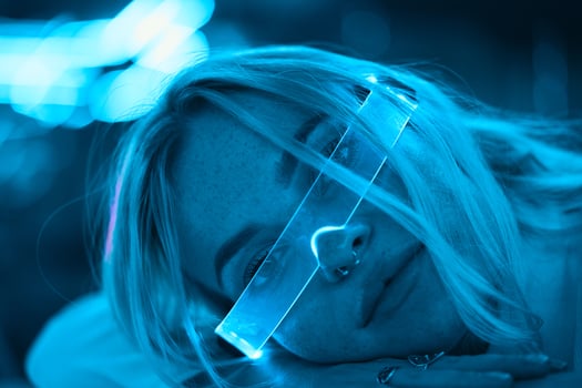 Portrait of a blonde in neon glasses. photo