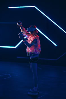 Young female gamer connect to virtual reality. photo