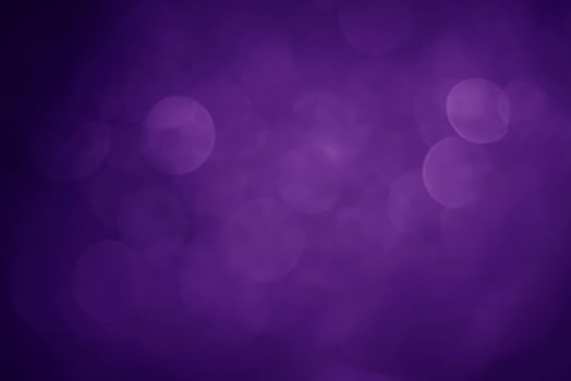 Abstract Purple Bokeh Blur Background with Proton Effect photo