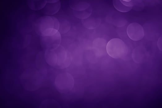 Abstract Purple Bokeh Blur Background with Proton Effect photo