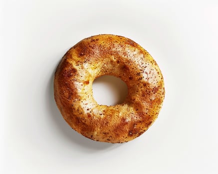 a bagel on a white surface with a number on it photo
